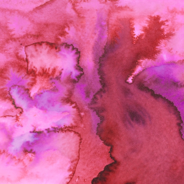 赤とピンクの水彩絵の具のブラシストロークの背景 無料の写真