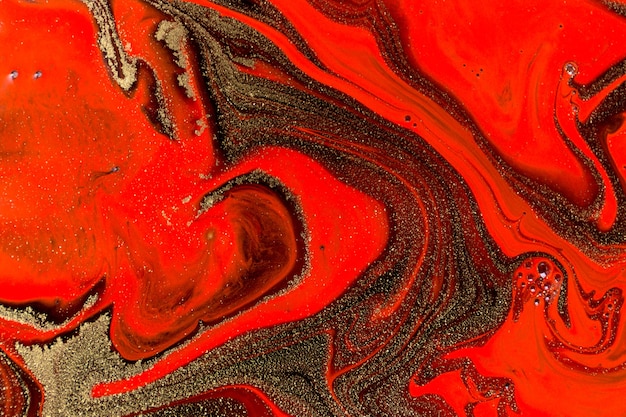 Premium Photo | Red black and gold marble fluid texture