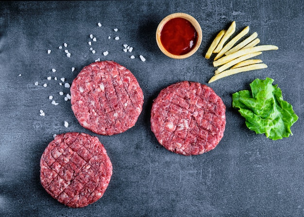 Premium Photo | Red burger meat closeup on black background