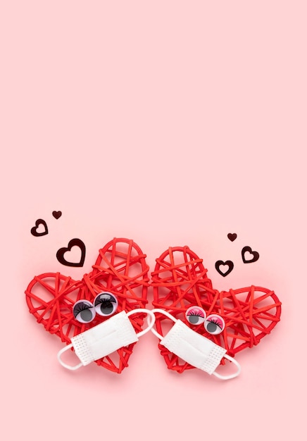 Premium Photo Red Hearts Couple In Love With Protective Mask Valentinea A A Valentine S Day Concept