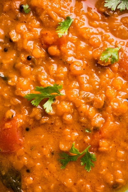 Premium Photo | Red lentil cooked dal or dhal or masoor daal tadka ...