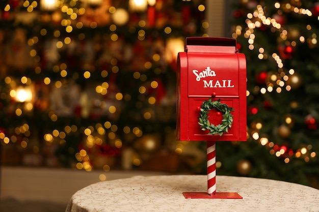 Premium Photo | Red mailbox for letters to santa claus on christmas  background