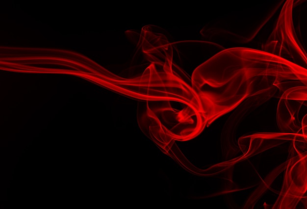 Premium Photo | Red smoke on black background. fire design and abstract art