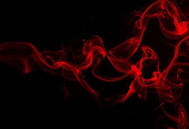 Red smoke on black background Photo | Premium Download