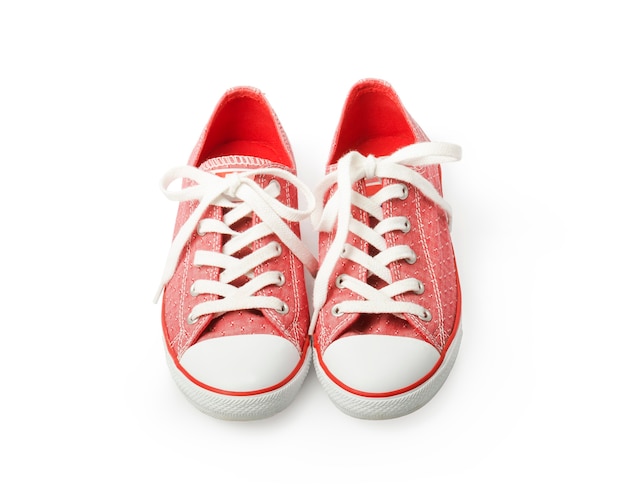 Premium Photo | Red sneakers on a white background youth shoes