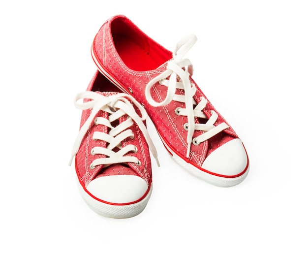 Premium Photo | Red sneakers on a white background