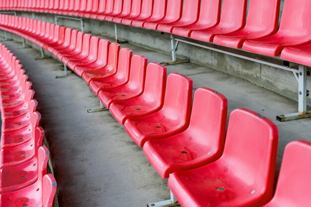 Premium Photo Red Stadium Seats After Rain Soccer Football Or Baseball Stadium Tribune Without Fans