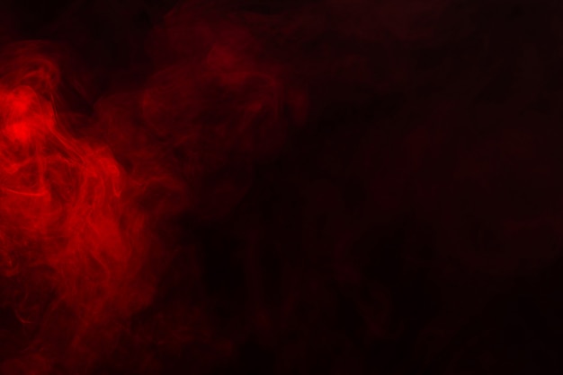 Premium Photo | Red steam on a black background