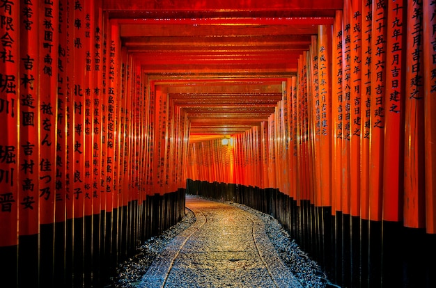 Premium Photo | The Red Torii Gates Walkway Path At Fushimi Inari