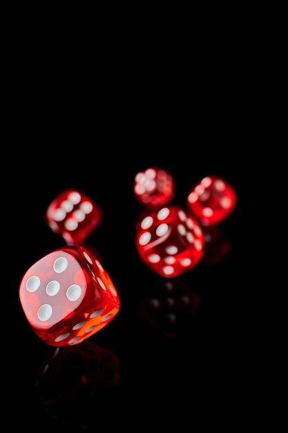 Premium Photo | Red and white craps or dices on reflective black background