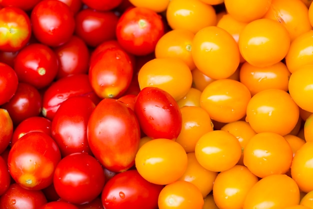 Download Premium Photo Red And Yellow Cherry Tomato