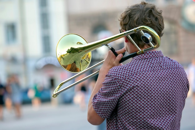 Premium Photo | Reflection of the street in the instrument solo trumpet ...