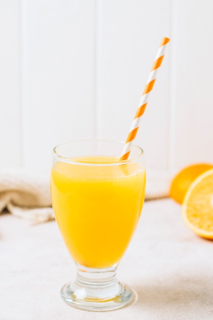 Free Photo Refreshing Orange Juice With Straw
