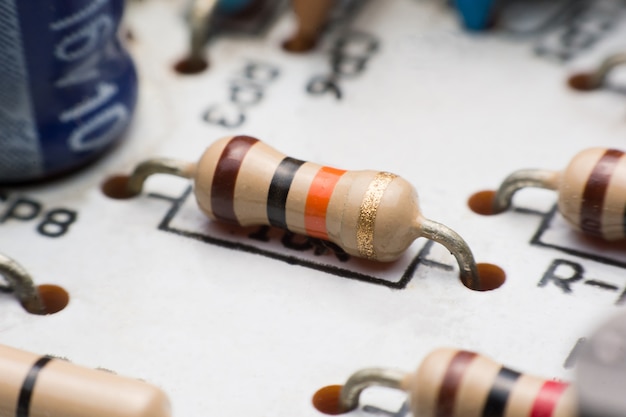 Premium Photo | Resistor on circuit board close up. electronic hardware