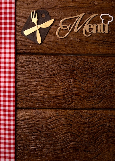 Premium Photo | Restaurant menu. top view of woodboard menu laying on ...