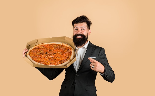 Premium Photo | Restaurant or pizzeria bearded businessman in suit ...