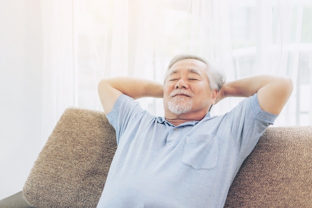 Premium Photo | A retired old man smiling , senior man relaxing on the ...