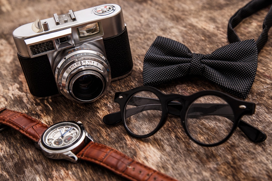 Free Photo | Retro camera, watch, bowtie and glasses