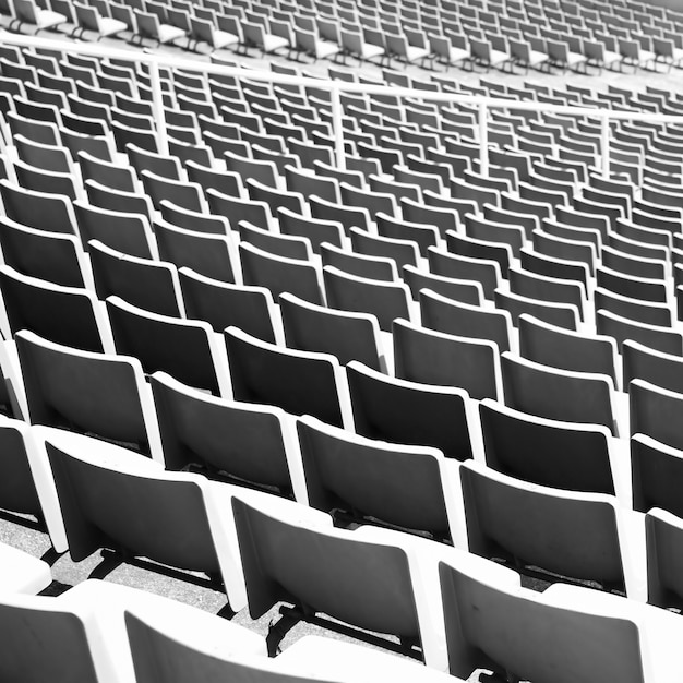 Premium Photo | Rhythm of stadium seats. black and white imade