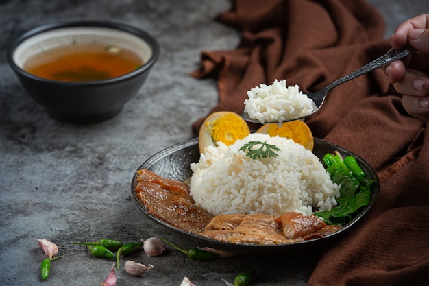 Free Photo | Rice with chinese pork stewed pork beautiful side dishes