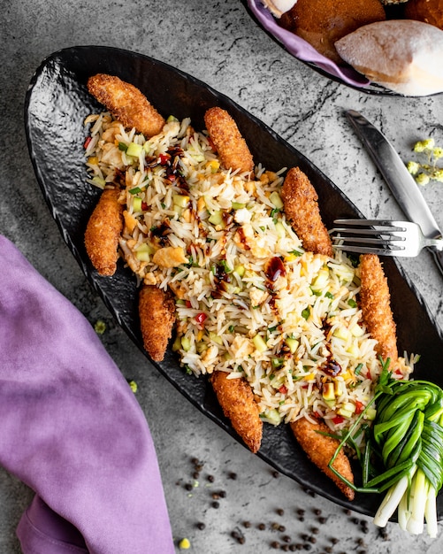 Free Photo Rice With Vegetables And Chicken Nuggets In Batter