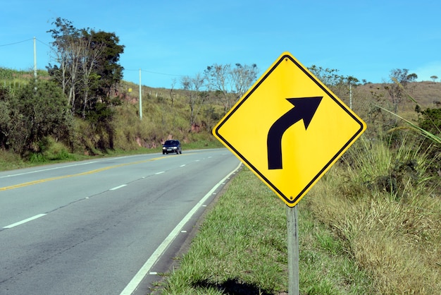 Premium Photo Right Curve Road Sign premium-photo-right-curve-road-sign
