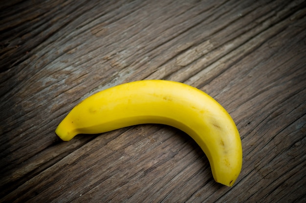 ripe-bananas-on-wooden-table-yellow-banana_41969-1438.jpg