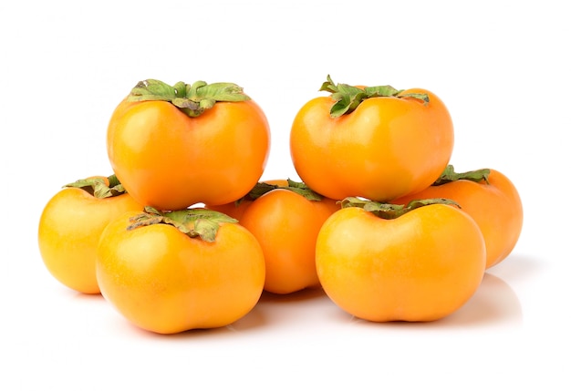 Premium Photo | Ripe persimmons isolated on white space