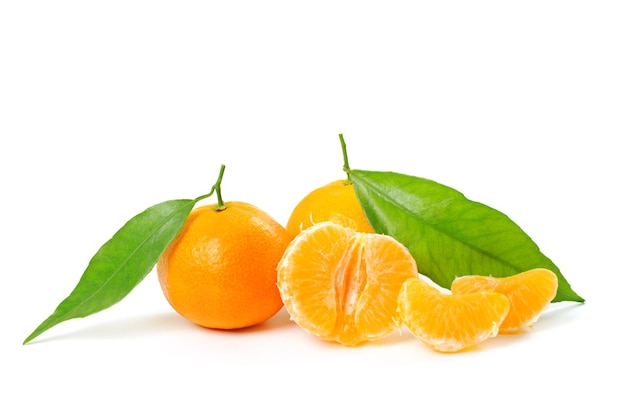 Premium Photo | Ripe tangerines (mandarin) with half and green leaf ...