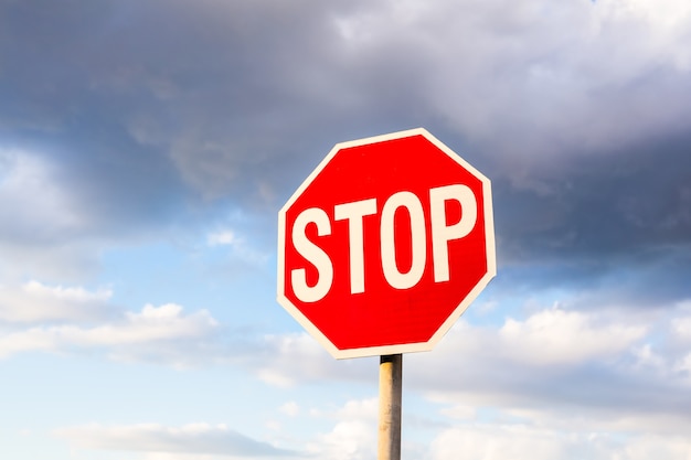 Premium Photo | Road sign stop on a sky background