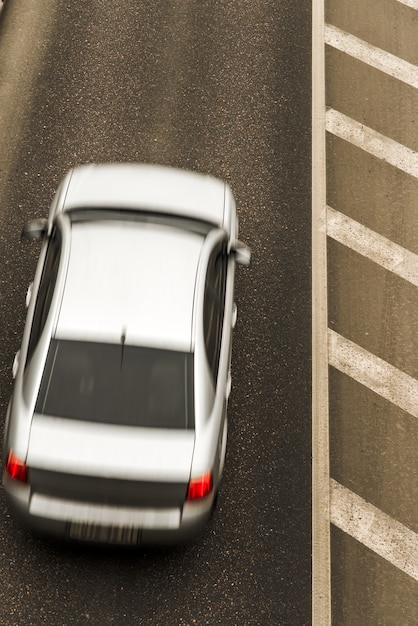 Premium Photo | Road with motion car, top view