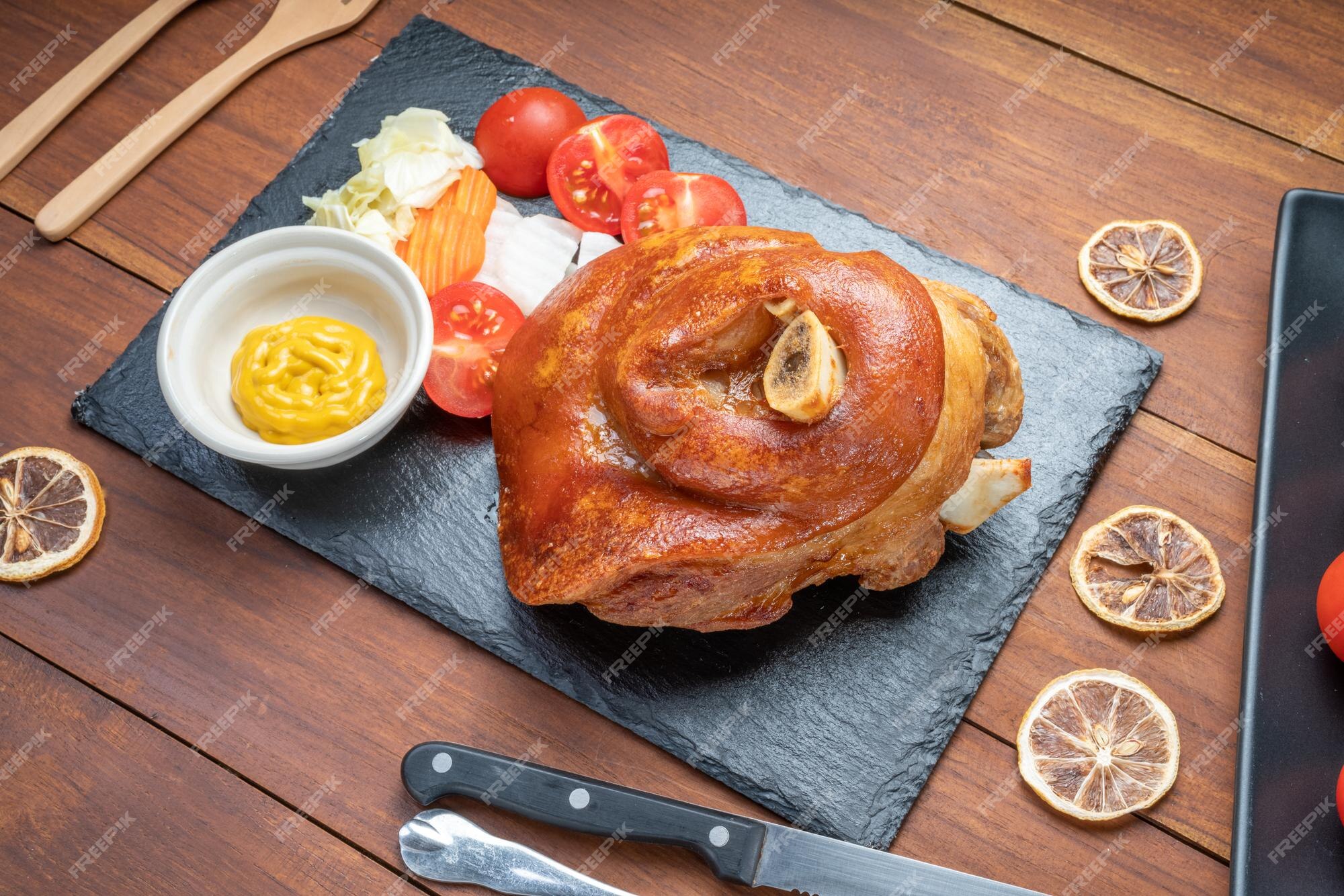 premium-photo-roast-pork-leg-on-hot-stone-plate-deep-fried-pork-or