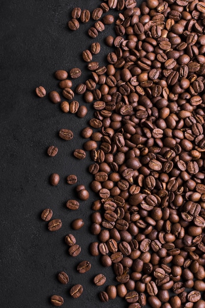 Premium Photo | Roasted beans of tasteful coffee on black background