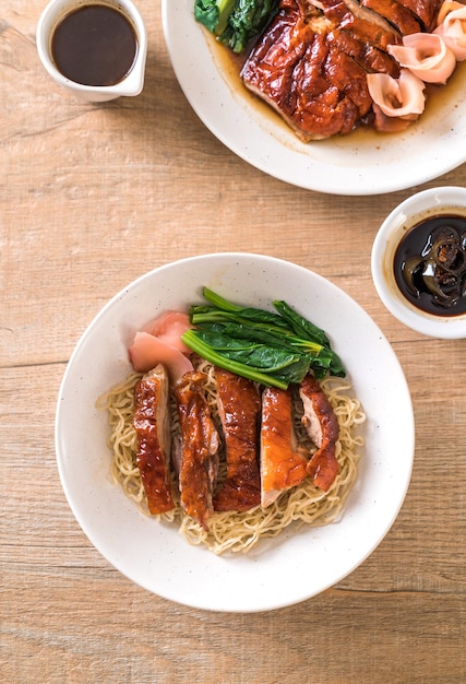 Premium Photo | Roasted duck noodles