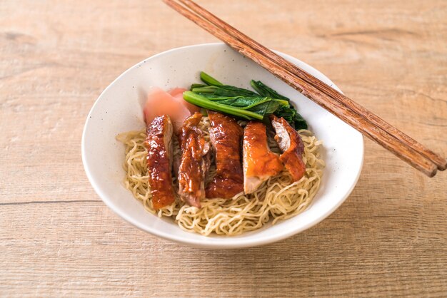 Premium Photo | Roasted duck noodles