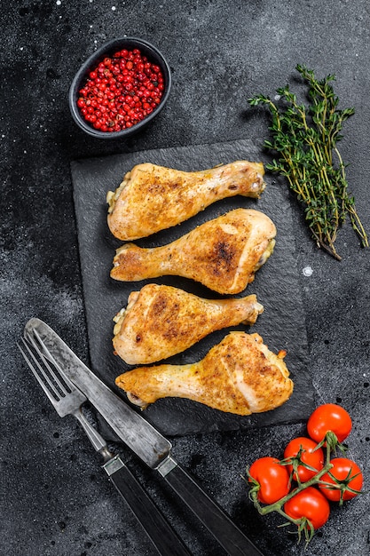 Premium Photo | Roasted spicy chicken drumstick