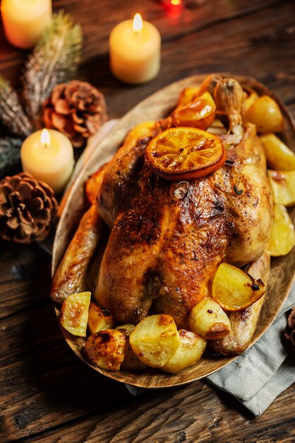 Premium Photo | Roasted turkey with potatoes