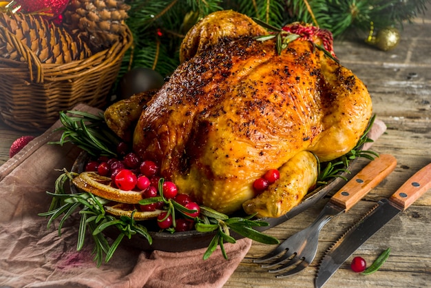 Premium Photo | Roasted whole chicken with christmas decoration