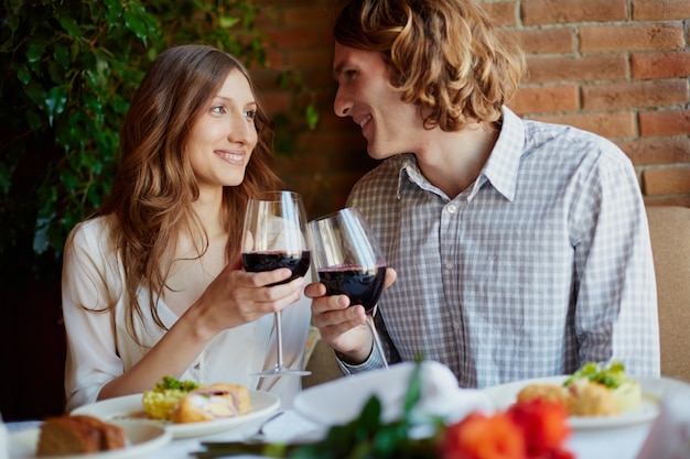 Romantic couple drinking wine in a restaurant Photo | Free Download