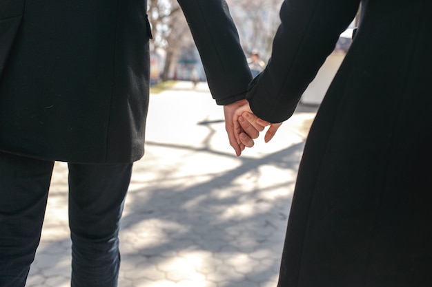 romantic photo holding hands