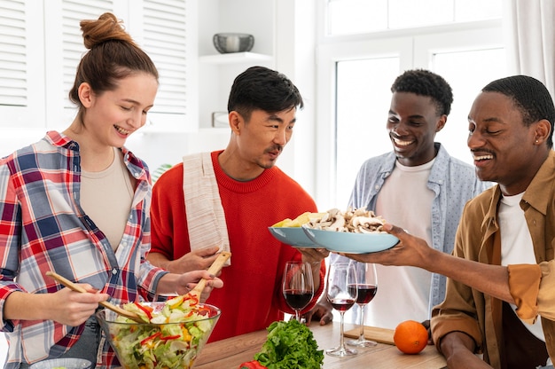 Free Photo | Roommates with delicious food medium shot