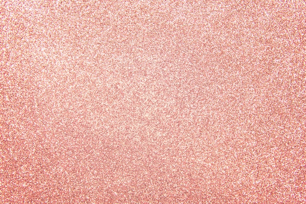 ローズゴールド 明るくピンクのシャンパン輝きキラキラパターン背景 プレミアム写真