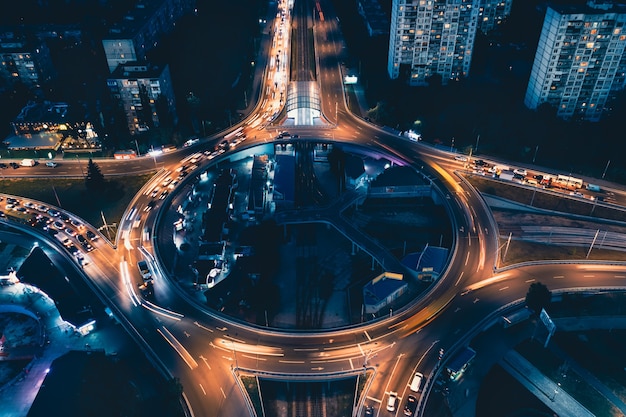 Premium Photo | Roundabout in the night city airial shot