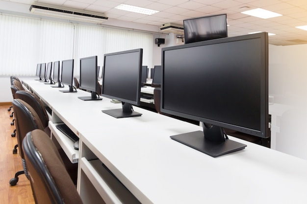 Row Of Computers On Desks In Classroom At General Training Center