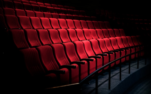 rows-of-red-seats-in-a-theater_53876-64710.jpg