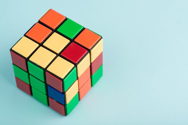 Rubik's cube on the light blue background | Premium Photo