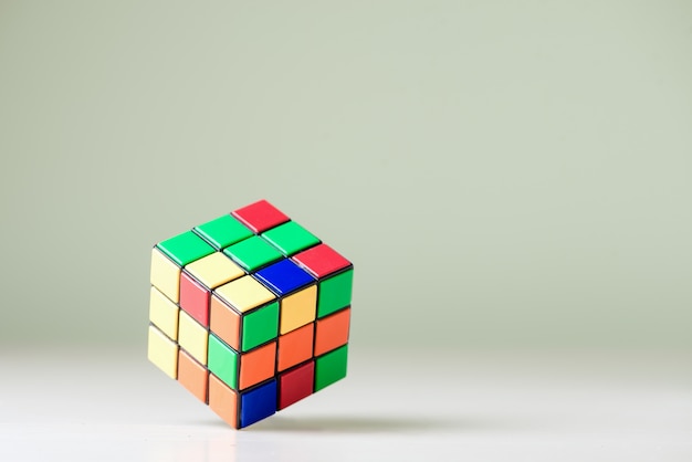 Rubik's cube on the light blue background | Premium Photo