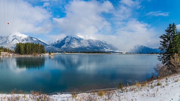 Premium Photo | Rundle forebay reservoir in winter sunny day. canmore