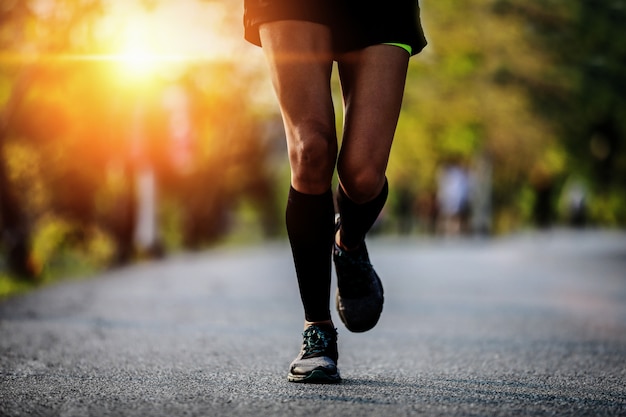 running barefoot on asphalt