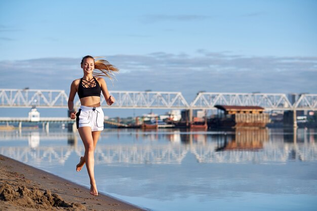 running in sand barefoot